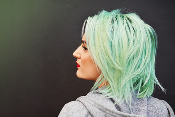 Mint green, back and woman with hair care, confidence, and trendy with cancer awareness project on...