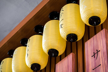 Asian style red paper lantern lamps hanging on ceiling
