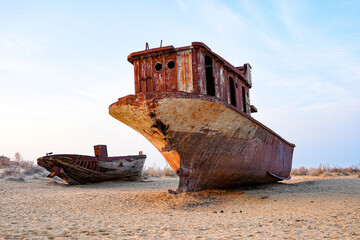Rusty shipwreck lying on the seabed of the dried-up Aral Sea in Moynaq (or Muynak), a former...