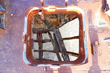 Rusty shipwreck lying on the seabed of the dried-up Aral Sea in Moynaq (or Muynak), a former...
