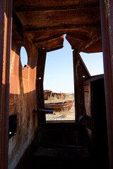 Rusty shipwreck lying on the seabed of the dried-up Aral Sea in Moynaq (or Muynak), a former...