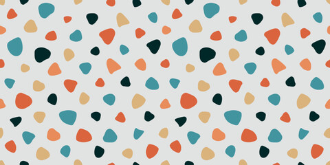 Seamless pattern with rounded smooth colored abstract spots, like the pattern of terrazzo mosaic tiles, beige marble stone floor with multi-colored chips inside the surface. Vector illustration of EPS