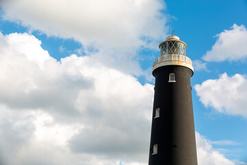 Historic disused lighthouse, which is still highly maintained for tourists and visitors, the tall...