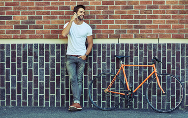 Happy, bicycle and man in city on phone call for mobile communication, urban and active lifestyle....