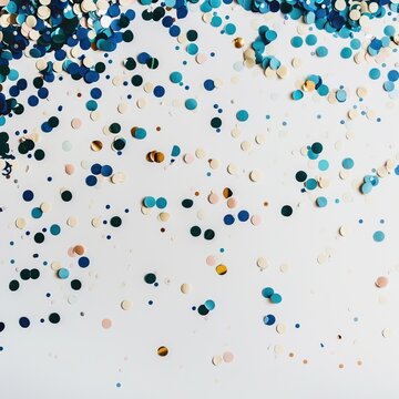 Blue confetti elements on a white background. Shot of confetti at a party. Festive mood. Blue confetti decoration and celebration. High quality AI generated image