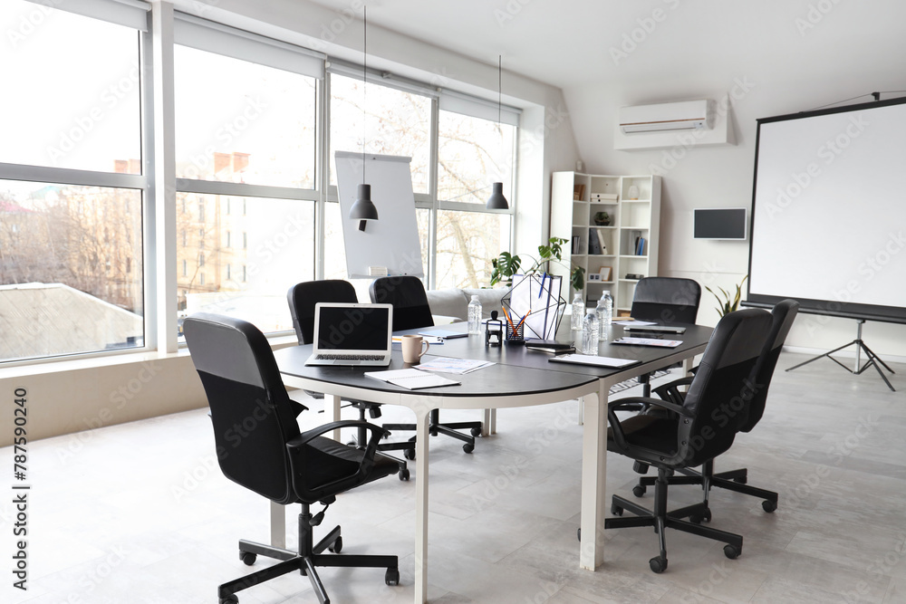 Canvas Prints Interior of stylish conference hall with table, window, screen board and armchairs