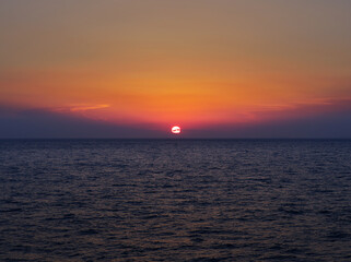 Beautiful sunset in aegean sea over ferry, Greece 
