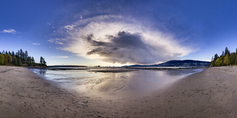 Dramatic Sunset on the beach. Panorama. Stanley Park, Vancouver, BC, Canada