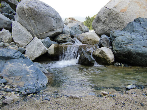 stream in the mountains, fresh and clean flowing water, river in Pakistan.