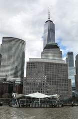 brookfield place ferry terminal on the hudson river in downtown manhattan with nyc skyline...