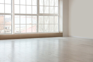 View of empty room with laminate floor and window