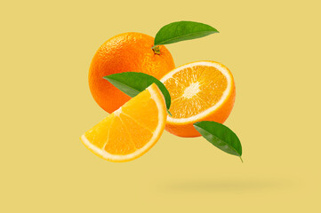 falling Fresh orange with leaves on yellow background. - 787617864
