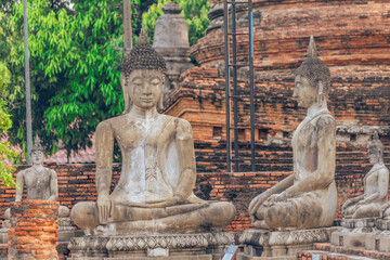The background of important religious attractions, Wat Yai Chai Mongkhon, has an old Buddha statue and a large pagoda for tourists to study the history of Ayutthaya in Thailand.