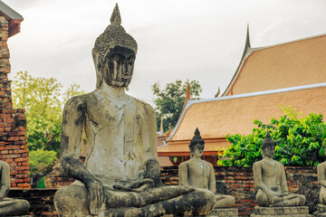 The background of important religious attractions, Wat Yai Chai Mongkhon, has an old Buddha statue...