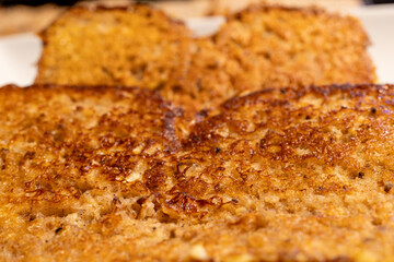 Thinly Sliced Whole Grain French Toast made with various grains including: flaxseed,  farro, khorasan wheat, quinoa, spelt, and chia seeds
