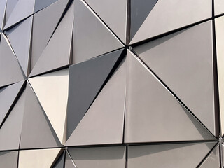 Geometrical triangular shape on metal building wall
