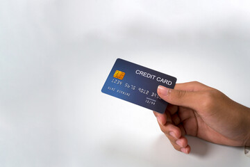 Credit card, in user's hand, focus on card, background. Isolate, banner, advertising space, copy space.