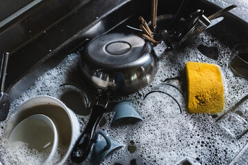 dirty dishes in sink