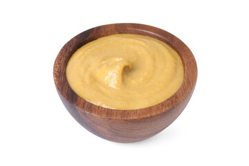 Fresh tasty mustard sauce in wooden bowl isolated on white