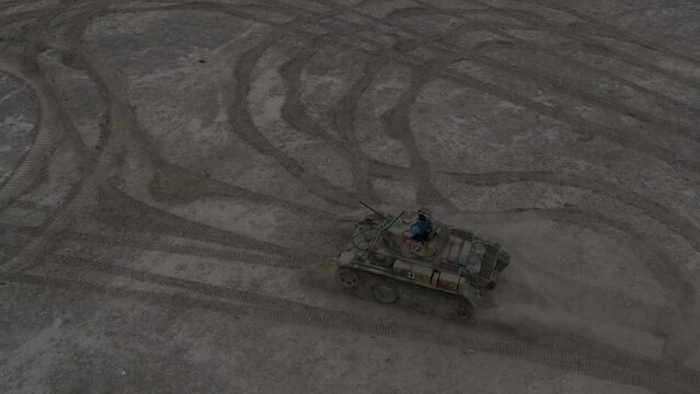 High drone shot over Panzer 2 Luch Tank off-roading