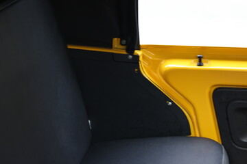 Yellow door of taxi vehicle