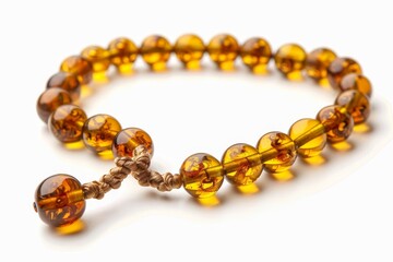 Amber rosary from the Baltic region on a white background
