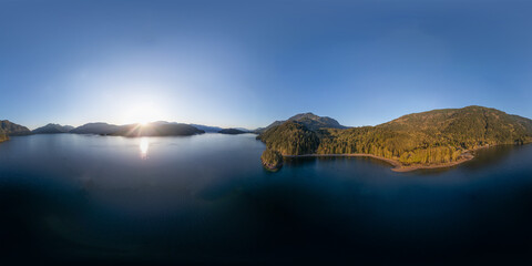 Aerial Lake and Canadian mountain landscape Panorama. Nature Background. BC, Canada. Sunset