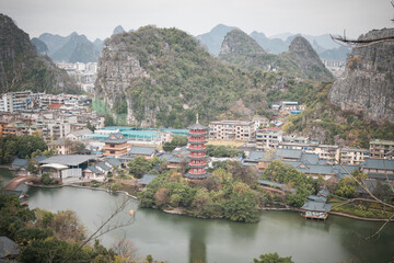 Fototapeta premium Lookout over Guilin City in South China. Ancient Pagoda in the middle