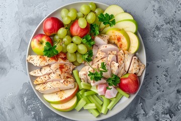 Top view of salad with chicken apples celery grapes