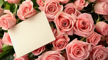 Bouquet of pink roses and a blank Mother's Day card