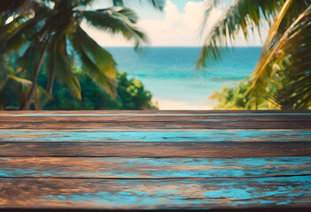 Tropical beach view over a rustic blue wooden table, with palm trees and turquoise sea in the...