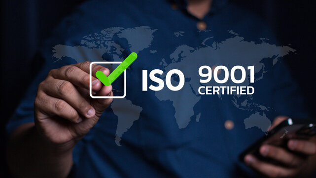 ISO 9001 Standard certification standardisation quality control concept, businessman choose ISO 9001 icons for certified and quality management of organizations.