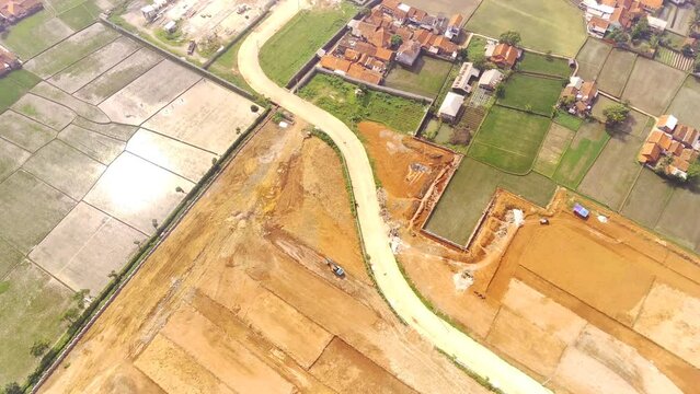 Hyper Lapse of winding road and leveled Land in industrial area. Landscape of new housing development area. Housing Industry. Above. Housing problems. Video shot with 4k resolution