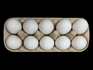 A Dozen Fresh Beginnings: White Eggs Neatly Arranged in a Carton