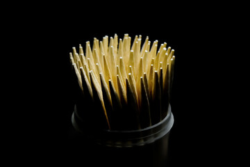 A Gleaming Array of Toothpicks Emerge from the Darkness