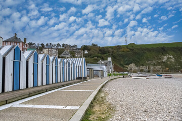 Yport, wooden beach cabins in Normandy, on the pebble beach
