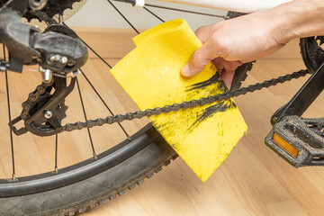 Dirty bicycle chain. Cleaning a dirty bike