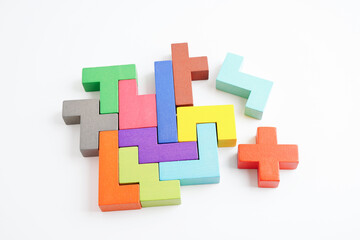 Logical thinking and problem solving problem solution creative business concept, wooden puzzle geometric block shape.
