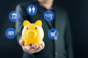 Businessman holding piggy bank with icons of planning family life, insurance, education, saving money wealth, shopping, investment and emergency fund. Savings and finance concept