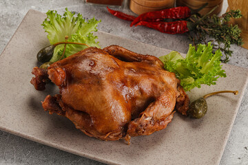 Baked small chicken with spices