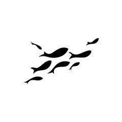 silhouette of swimming fish