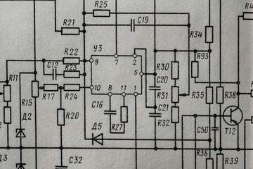 Old radio circuit printed on vintage paper electricity diagram as background. Electric radio scheme from USSR - 787811034