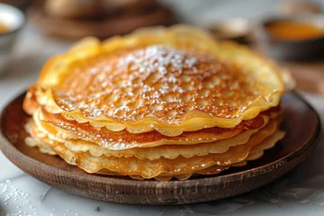  Stack of pancakes with sugar powder in the wooden plate © Aleksandr Bryliaev