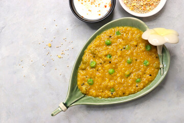 Healthy Quinoa dal khichdi. Made with quinoa, lentils, veggies, and spices, this quinoa dal khichdi is a one pot nutritious weight loss meal. Served with yogurt or curd. Copy Space