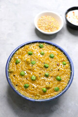 Healthy Quinoa dal khichdi. Made with quinoa, lentils, veggies, and spices, this quinoa dal khichdi is a one pot nutritious weight loss meal. Served with yogurt or curd. Copy Space