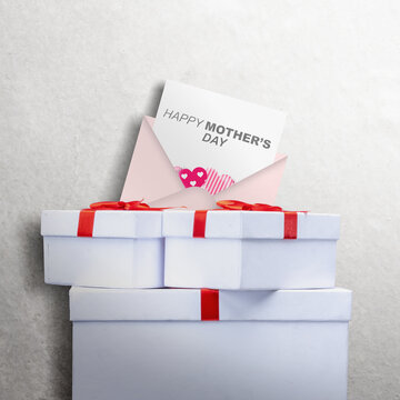 The letter with Happy Mother's Day text and a gift box