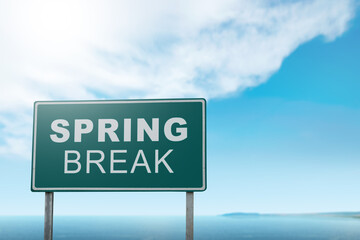 Summer break is shown using the text with green sign board against the beautiful blue sky. - 787869043