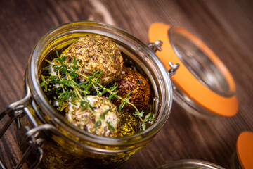 RECIPE FOR LABNEH CHEESE BOLLS WITH DRY MINT, BLACK AND WHITE SESAME, SUMAC AND ZAATAR IN A JAR WITH OLIVE OIL. High quality photo - obrazy, fototapety, plakaty