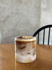 Close up Ice coffee on wood tab. Ice latte