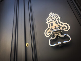Door and knocker of a stylish French mansion, High quality photo